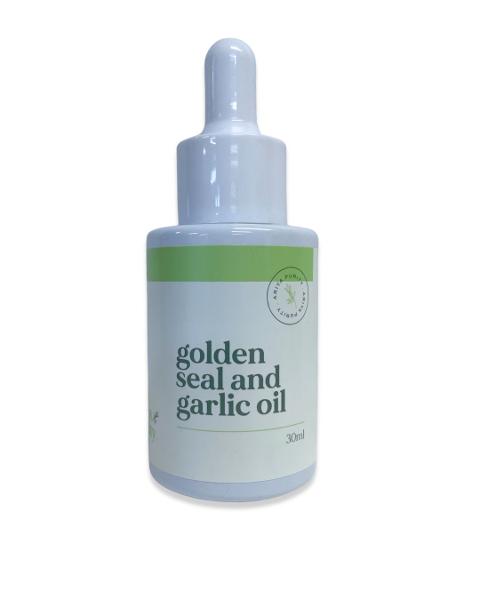 Bottle of golden seal and garlic oil on a white background