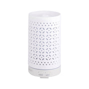 White diffuser with decorative pattern on a white background