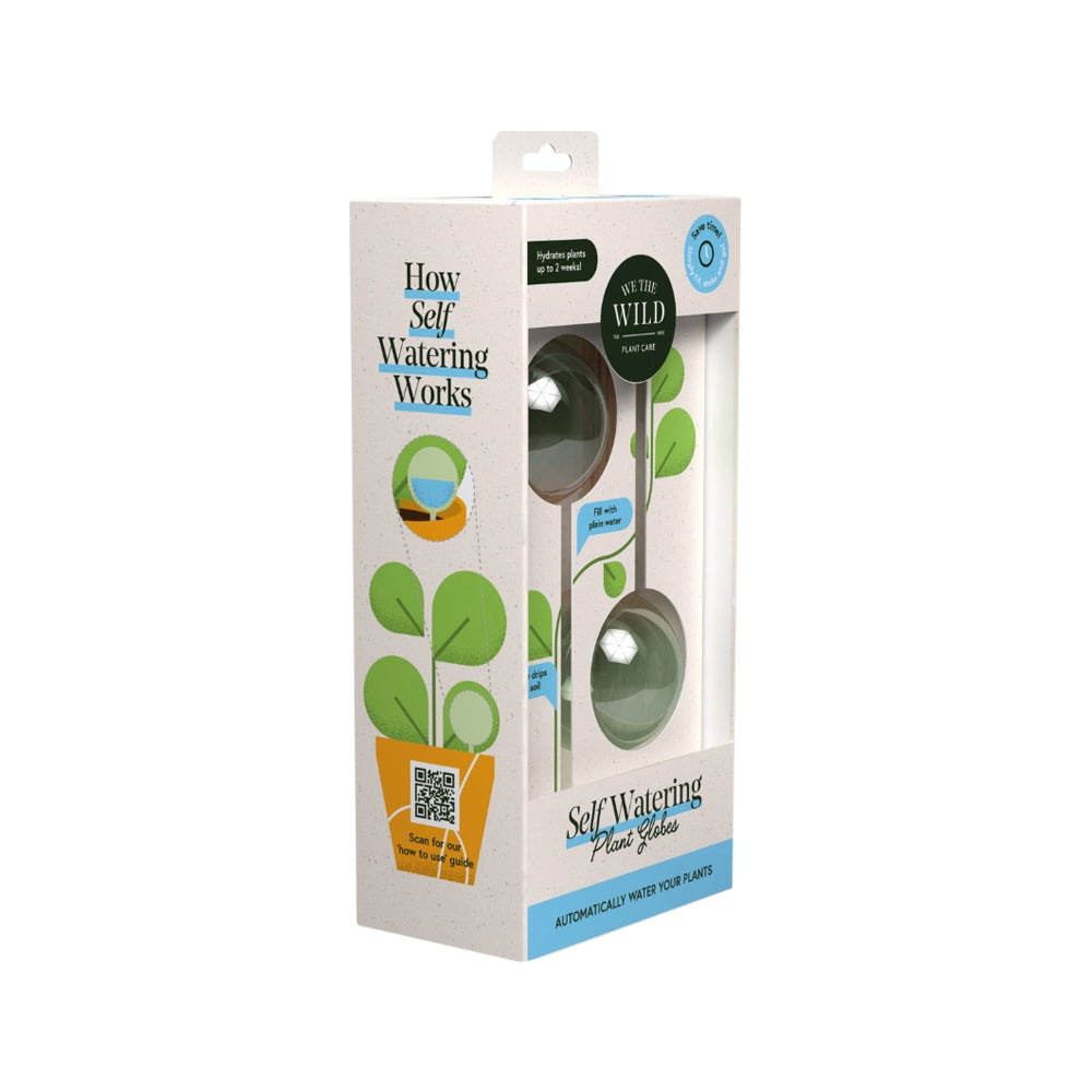 Self-watering plant globes in packaging with 'We the Wild' branding on a white background.