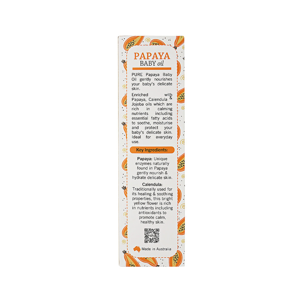 Papaya baby oil packaging with text and illustrations on a white background