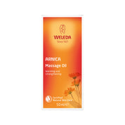 Weleda Arnica Massage Oil packaging on a white background