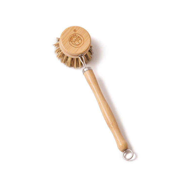 Wooden dish brush with a natural bristle head on a white background