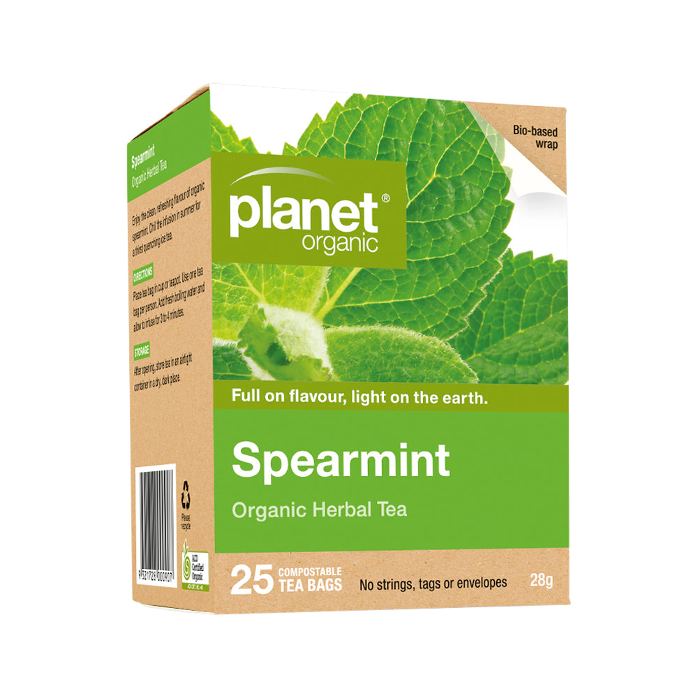 Box of planet organic Spearmint Organic Herbal Tea with green leaves on a white background